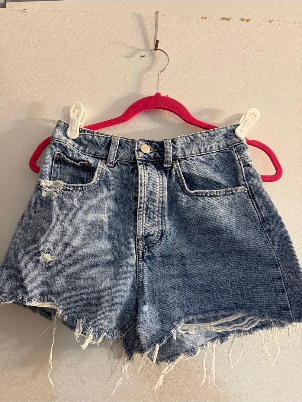 High-Rise Distressed Light Blue Denim Shorts